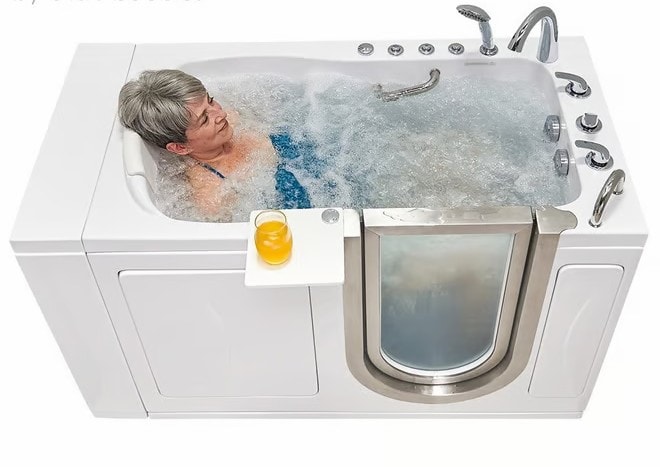 Senior woman relaxing in a hydrotherapy walk-in tub